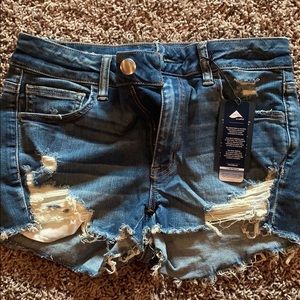 Distressed dark wash high rise short